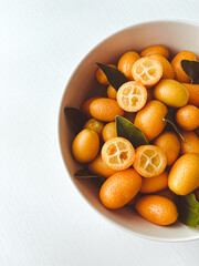 Kumquat in a plate on the table