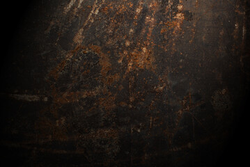 Dark abstract background with scuffs and scratches. Metal texture with rust