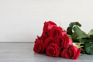 Bouquet of red roses . Background .Holiday greeting concept. Mother's day, Valentine's day February 14, father's day, birthday.
