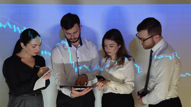 Group of businesspersons or traders meeting in the office with cryptocurrency chart on background. Leadership and teamwork concept. Financial technology. Fintech