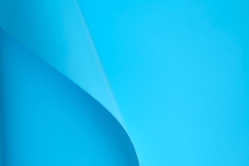 Abstract blue geometry background with copy space. Top view. Close-up image. Concepts: origami, color, lines and geometry.