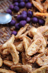 Thai deep fried banana fritters selling by street vendor in Bangkok