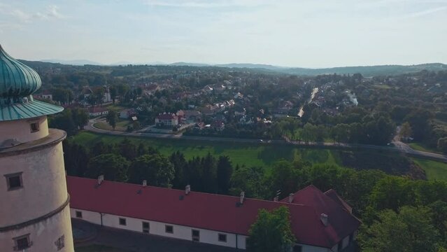 aerial view of Warsaw old town, historical centre of Warsaw at sunrise, flying above Warsaw royal castle, capital of Poland, tourism in Eastern Europe. High quality 4k footage