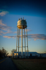 water tower at sunset