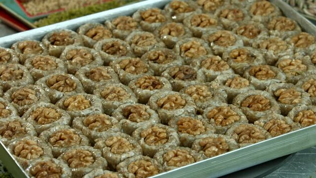 Traditional turkish baklava pistachio pastry. Dilberdudagi, ozel kesim baklava, cikolatali baklava, fistikli baklava, katmer, fistikli kadayif, kattafi, fistik sarma, soguk baklava, midye baklava, cev