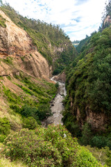 Fototapeta na wymiar mountain river in the earth's rift