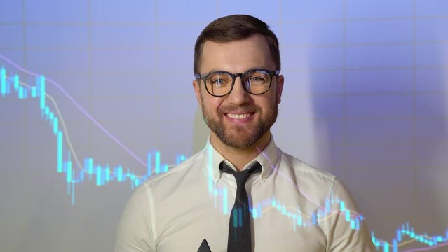Confident professional businessman looking in camera with stock trade or cryptocurrency graph in background