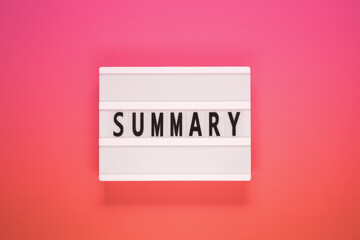 The word Summary on lightbox. Business concept.