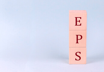 EPS on wooden cubes on a blue background