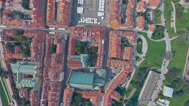 aerial view of Warsaw old town, historical centre of Warsaw at sunrise, flying above Warsaw royal castle, capital of Poland, tourism in Eastern Europe. High quality 4k footage