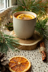 Green tea, Christmas tree branches, dried oranges, cloth mat