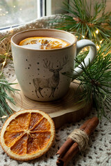 Green tea, Christmas tree branches, dried oranges, cloth mat