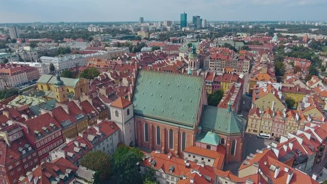 aerial view of Warsaw old town, historical centre of Warsaw at sunrise, flying above Warsaw royal castle, capital of Poland, tourism in Eastern Europe. High quality 4k footage