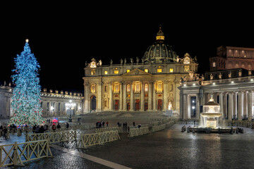 St. Peter's Square illuminated at night and decorated for Christmas.