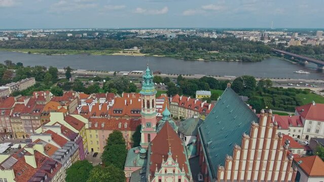 aerial view of Warsaw old town, historical centre of Warsaw at sunrise, flying above Warsaw royal castle, capital of Poland, tourism in Eastern Europe. High quality 4k footage