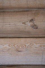 Old textured wood planks with knots and scratches.