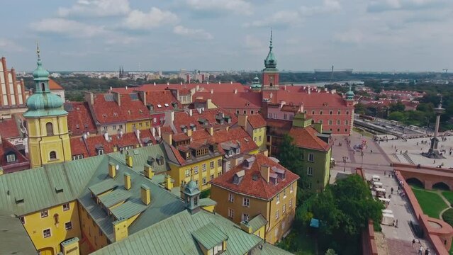 aerial view of Warsaw old town, historical centre of Warsaw at sunrise, flying above Warsaw royal castle, capital of Poland, tourism in Eastern Europe. High quality 4k footage