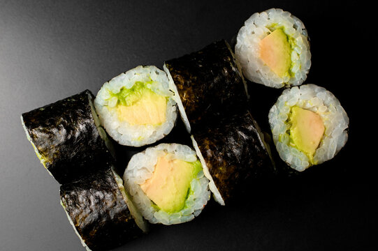 Top View On Classic Vegetarian Sushi Rolls With Tofu And Rice Wrapped In Nori.