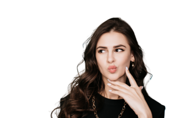 Attractive young brunette woman with wavy hair looking aside over transparent background with copy space for ad. Close up portrait of beautiful model with perfect skin and hair. Beauty, fashion.