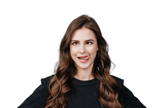 Playful brunette young woman in black sweater shows tongue, squinted eyes over transparent background at studio. Close up portrait of hispanic girl with mad face expression. Having fun, joking. Drunk