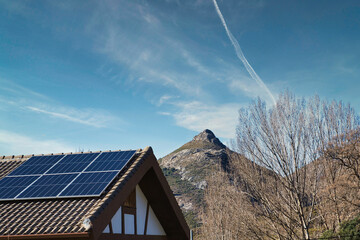 Mountain house with solar panels on the roof in Andalucia (Spain)