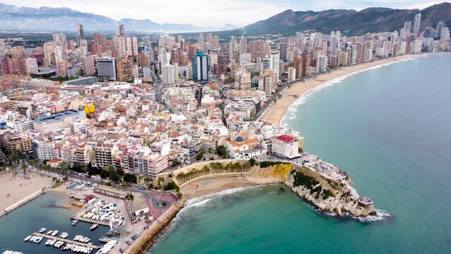 Aerial perspective of Benidorm city center. View of "Balc&oacute;n del Mediterr&aacute;neo" and Benidorm Marina. In background the skyscrapers close to Playa de Levante. 