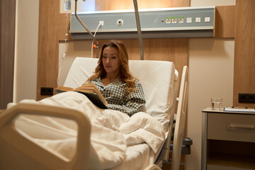 Adult lady resting in hospital during treatment