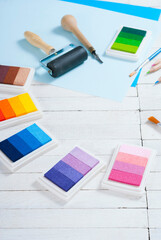 creative hobby tools on white wood