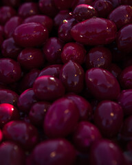 purple olives on sale in a food market.