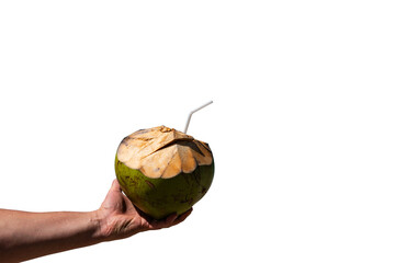 Male hand holds coconut cocktail on isolated png background - 563129915