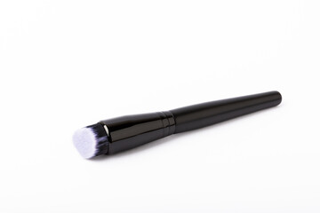 Cosmetic makeup brush isolated on white background.