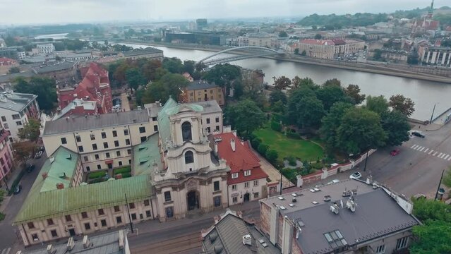 aerial view of Warsaw old town, historical centre of Warsaw at sunrise, flying above Warsaw royal castle, capital of Poland, tourism in Eastern Europe. High quality 4k footage