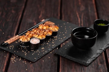 Japanese hot maki roll sushi with shrimp top view - asian food concept