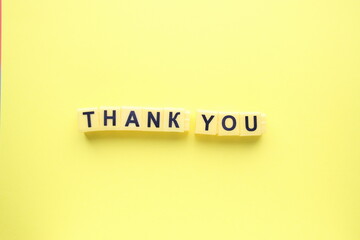 Thank you, the inscription on a yellow background