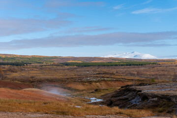 Geysir (The Great Geysir) geyser in southwestern Iceland. Geysir in Haukadalur valley on the slopes of Laugarfjall hill, which is also the home to Strokkur geyser.