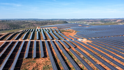Aerial. Station's solar panels cover the fields of the Portuguese hills to generate clean, ecological electrical energy.
