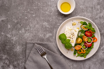 Food photography of feta salad, vegetable, tomato, cucumber, onion, lettuce, romaine, sauce, bell pepper