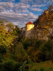 Beautifully colored autumn gardens at Prague Castle with views of St. Vitus or Palace of the Castle. Prague, Czech Republic