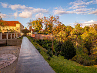Beautifully colored autumn gardens at Prague Castle with views of St. Vitus or Palace of the Castle. Prague, Czech Republic