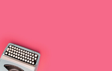 Overhead top view of a vintage aqua blue typewriter against a pink background - obrazy, fototapety, plakaty