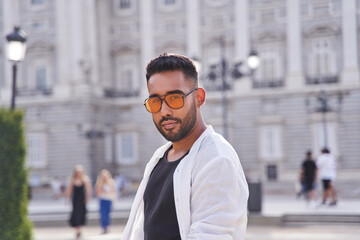 portrait of a bearded hispanic man looking at the camera