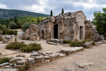 Ayios Marcos temple also called Fragomonastiro is a three aisled early Christian basilica with a narthex located at the archaeological site of Taxiarches Hill in Kaisariani district, Athens, Greece