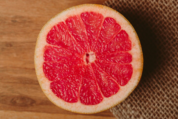 Fototapeta na wymiar Halved grapefruit top view