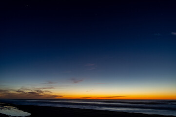 Fototapeta na wymiar Beach with Blue Gradient Sky Background 