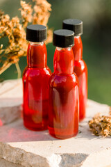 St. John's wort oil in different bottles