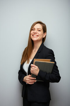 Smiling School Teacher Woman Or Adult Student With Book. Isolated Business Lady Portrait With Black Suit.