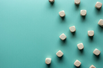 There is wood cubes on the colored background with title space on the left.