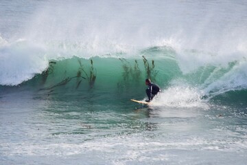 Wave with Surfer and Seaweed © Angelica Glass