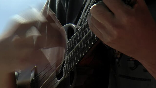 Man Playing a "Charango", Small Andean Stringed Instrument, Jujuy, Argentina. Close Up.