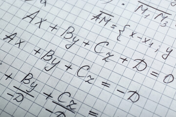 Sheet of paper with different mathematical formulas, closeup